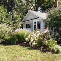 House with Flowering Landscape
